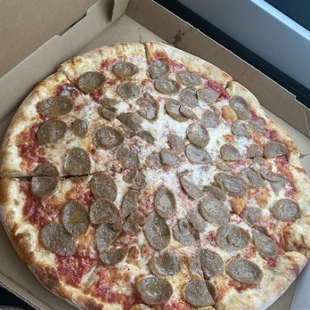Home Slice Pizza - Large red pizza (18")  with topping of sausage - Pizza Near Me - Austin, Texas
