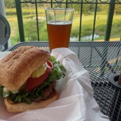 Cozy's Pub - California burger, enjoying the view of the 18th hole.