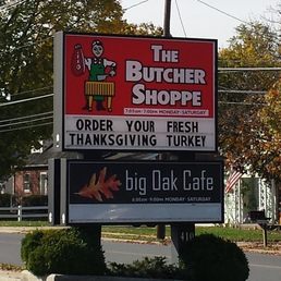 The sign for the Big Oak Cafe
