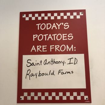 Five Guys - a sign that says today's potatoes are from - Burgers Near Me - South Hill, Virginia