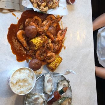 The Boiling Crab - soft shells crab, 1lb shrimp with corn..... and 1/2 dozen raw oyster - Seafood Near Me - Honolulu, Hawaii