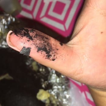 El Jaripeo - a finger with a black substance on it - Restaurants Near Me - Roma, Texas
