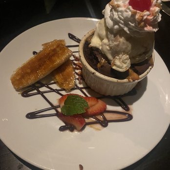 C Level - Homemade brownie with homemade peanut butter ice cream and brûléed bananas - New American Near Me - San Diego, California