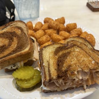 The Blue Berry Cafe - Turkey Reuben Sandwich with tots delicious!! - Waffles Near Me - Bellbrook, Ohio The Blue Berry Cafe - Turkey Reuben Sandwich with tots delicious!! - Waffles Near Me - Bellbrook, Ohio