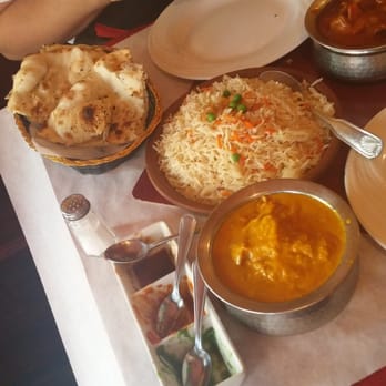 Joy Indian Restaurant - chicken malai (yellow), rice, garlic naan, vindaloo (red) - Indian Near Me - Brooklyn, New York
