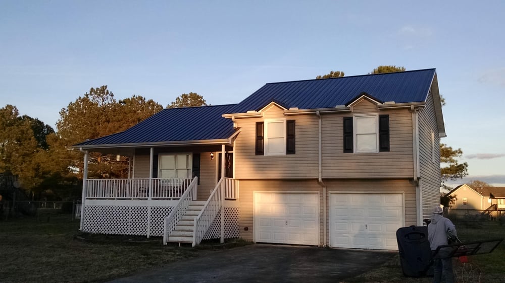 Slide of JC Metal Roofing