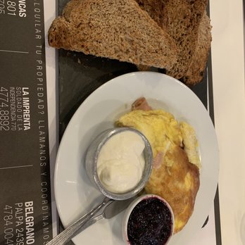 Central Cook - Saint Tropez. Ham and Brie omelet with delicious toast and berry jam. Idk what the white spread was but it was delish too! - Coffee & Tea Near Me - Buenos Aires, C