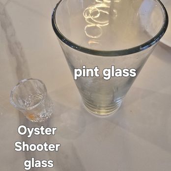 Ikura - Pint glass empty that held my Sapporo and the tiny $8 Oyster Shooter glass I was served. It was not worth $8. - Sushi Bars Near Me - Rocklin, California Ikura - Pint glass empty that held my Sapporo and the tiny $8 Oyster Shooter glass I was served. It was not worth $8. - Sushi Bars Near Me - Rocklin, California