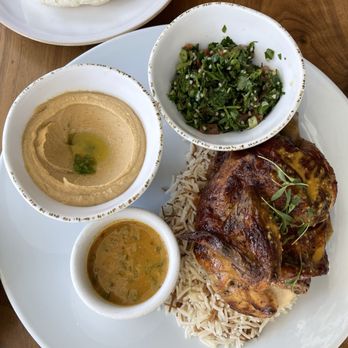 Ammatoli - Spicy Garlic Lemon Chicken with tabbouleh and spicy hummus - Mediterranean Near Me - Long Beach, California Ammatoli - Spicy Garlic Lemon Chicken with tabbouleh and spicy hummus - Mediterranean Near Me - Long Beach, California