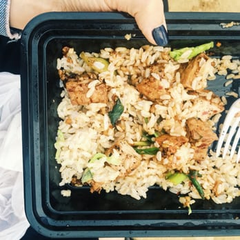 Bahn Thai - Half eaten (lol) "GARLIC" w/ brown rice & tofu. $9.67. - Thai Near Me - San Diego, California