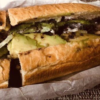Las Tortas - Breaded beef with black beans crema avocado & red onions on French bread - Mexican Near Me - McAllen, Texas