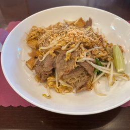 Spicy beef pad Thai with rice noodles. Spicy beef pad Thai with rice noodles.