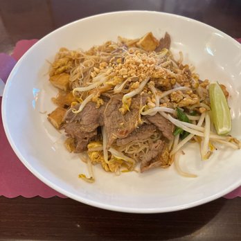 Nine Thai Cuisine - Spicy beef pad Thai with rice noodles. - Thai Near Me - Pitman, New Jersey Nine Thai Cuisine - Spicy beef pad Thai with rice noodles. - Thai Near Me - Pitman, New Jersey