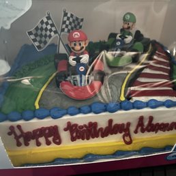 Mario and Luigi bday cake. Vanilla cake w/choc chip ice cream Mario and Luigi bday cake. Vanilla cake w/choc chip ice cream