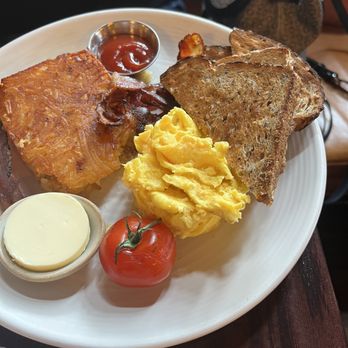 OAK Long Bar + Kitchen - THE AMERICAN DREAM two-country hen eggs any style, backyard farms tomato, breakfast potato hash, served with coffee and juice - Bars Near Me - Boston, Massachusetts OAK Long Bar + Kitchen - THE AMERICAN DREAM two-country hen eggs any style, backyard farms tomato, breakfast potato hash, served with coffee and juice - Bars Near Me - Boston, Massachusetts