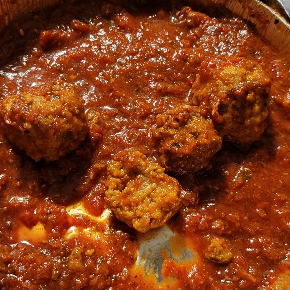 Freddy’s Pizza - This is the order of 4 meatballs for 6.99 and one meatball is cut in half - Pizza Near Me - Oxnard, California