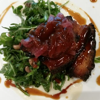 One Flew South - Thyme seasoned pork belly with arugula salad. Yum! - New American Near Me - Atlanta, Georgia