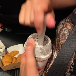 McDonald's - My friend blending the mcflurry herself and getting it everywhere