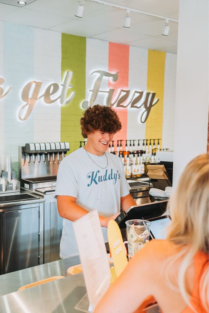 Kuddy’s Sips And Sweets Logo