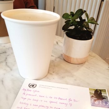 Kodawari Coffee - Chai latte. A cute succulent. And a lovely postcard from my friend. - Coffee & Tea Near Me - New York, New York