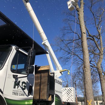 Higher Ground Tree Care - New bucket truck hard at work - Tree Services Near Me - Granger, Indiana