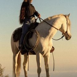 High Horse Malibu - Trail guide Anna, taking in the breathtaking views on horseback. Malibu horseback riding at its finest!