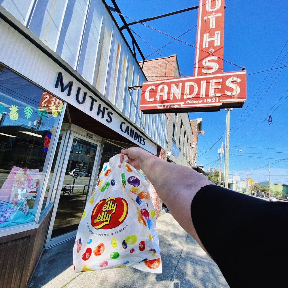 Muth's Candy - a hand holding a bag of candy - Candy Stores Near Me - Louisville, Kentucky Muth's Candy - a hand holding a bag of candy - Candy Stores Near Me - Louisville, Kentucky