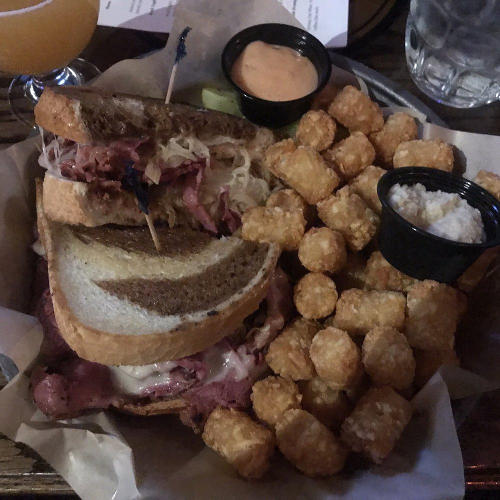 Three Blind Mice Irish Pub - This big, beautiful Reuben sandwich is awesome in every possible way: tasty and massive. The tots I added are perfectly crispy & delicious. - Irish Pub Near Me - Mount Clemens, Michigan