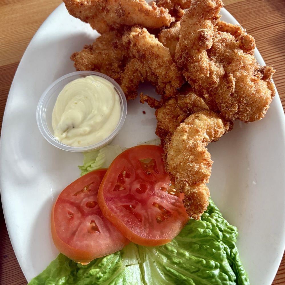 Fried shrimp plate without fries because I up charged for a salad. Fried shrimp plate without fries because I up charged for a salad.