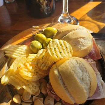 Little Madrid Tapas Cafe - Serrano ham sandwiches with chips and olive - Spanish Near Me - Chicago, Illinois