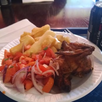 Chicken Rico - Quarter chicken white with yucca and tomato salad. - Peruvian Near Me - Herndon, Virginia