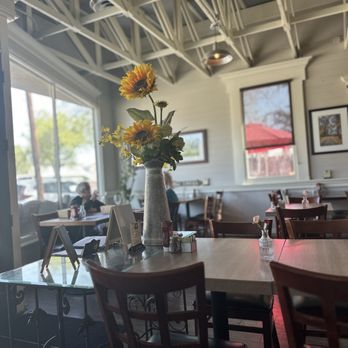 Plenty on Bell - Inside tables and red umbrellas on the patio. - Breakfast & Brunch Near Me - Los Alamos, California Plenty on Bell - Inside tables and red umbrellas on the patio. - Breakfast & Brunch Near Me - Los Alamos, California