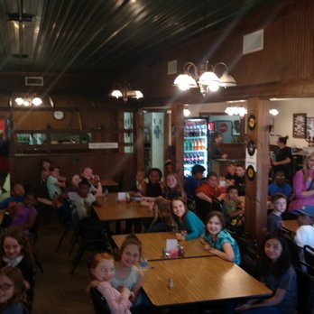 Venice Pizza - a large group of children sitting at tables in a restaurant - Pizza Near Me - Linden, Texas Venice Pizza - a large group of children sitting at tables in a restaurant - Pizza Near Me - Linden, Texas