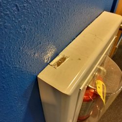 GF Fitness - Razor blade on Fire Extinguisher