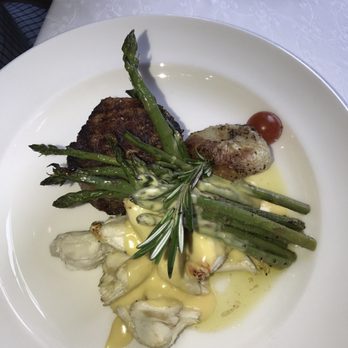 Grill 225 - 8oz Wet Ageds steak with 4oz of lump crab meat drizzled with hollandaise sauce - Steakhouses Near Me - Charleston, South Carolina
