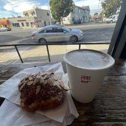 Almond croissant and horchata latte Almond croissant and horchata latte