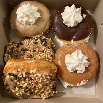Manley's Donuts - Maple filled with whipped cream, chocolate filled with whipped cream, glaze filled with whipped cream, and Reese's donuts - Donuts Near Me - Roseville, California
