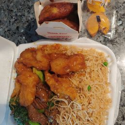 Spicy fish but it's mild and very good. Beef broccoli, half noodles half fried rice and fried plantain bananas.