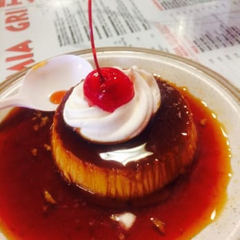 Latin Bohemia - Very Rich Coconut Flan, not sure why the plastic spoon, but oh well. - Latin American Near Me - Pompano Beach, Florida Latin Bohemia - Very Rich Coconut Flan, not sure why the plastic spoon, but oh well. - Latin American Near Me - Pompano Beach, Florida