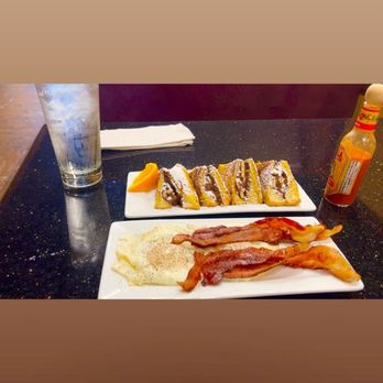 Keke's Breakfast Cafe - Basted eggs bacon and Nutella French toast - Breakfast & Brunch Near Me - South Pasadena, Florida Keke's Breakfast Cafe - Basted eggs bacon and Nutella French toast - Breakfast & Brunch Near Me - South Pasadena, Florida
