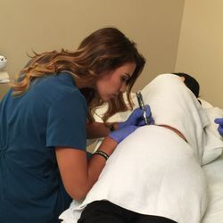 The Medspa Austin - Medical Esthetician Coco performing microneedling for stretch marks.