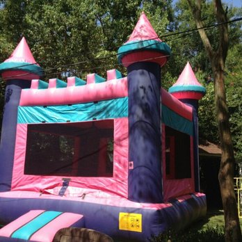 Bouncers R Us - Pink & purple castle jumper rents $125 - Bounce House Rentals Near Me - Picayune, Mississippi