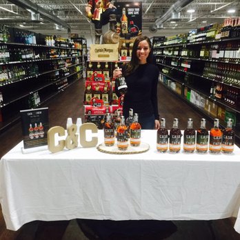Wine Republic - a woman standing behind a table with bottles of wine - Beer, Wine & Spirits Near Me - Trenton, New Jersey Wine Republic - a woman standing behind a table with bottles of wine - Beer, Wine & Spirits Near Me - Trenton, New Jersey