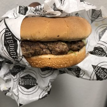 Fatburger & Buffalo's Express - a burger wrapped in paper - Burgers Near Me - Suisun City, California Fatburger & Buffalo's Express - a burger wrapped in paper - Burgers Near Me - Suisun City, California