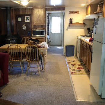 Idyllwild Vacation Cabins - Oak tree kitchen and living room combined space - Vacation Rental Agents Near Me - Idyllwild, California