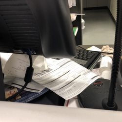 USPS - Reps messy desk