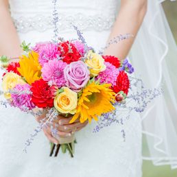 My wedding bouquet they were able to make with a weeks notice. EXACTLY what I wanted!!! Photography by Nilo Burke Photography.