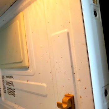 Triron Services Company - Microwave food splatter not cleaned inside at all. - Home Cleaning Near Me Triron Services Company - Microwave food splatter not cleaned inside at all. - Home Cleaning Near Me