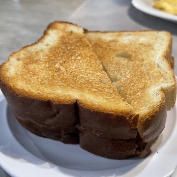 The Hideout Kitchen & Cafe - a toasted sandwich on a plate - Diners Near Me - West Palm Beach, Florida The Hideout Kitchen & Cafe - a toasted sandwich on a plate - Diners Near Me - West Palm Beach, Florida