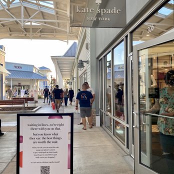 kate spade new york outlet - The line outside to limit the number of customers, and sign about social distancing & mask moutside the Kate Spade store. - Accessories Near Me - Lutz, Florida kate spade new york outlet - The line outside to limit the number of customers, and sign about social distancing & mask moutside the Kate Spade store. - Accessories Near Me - Lutz, Florida
